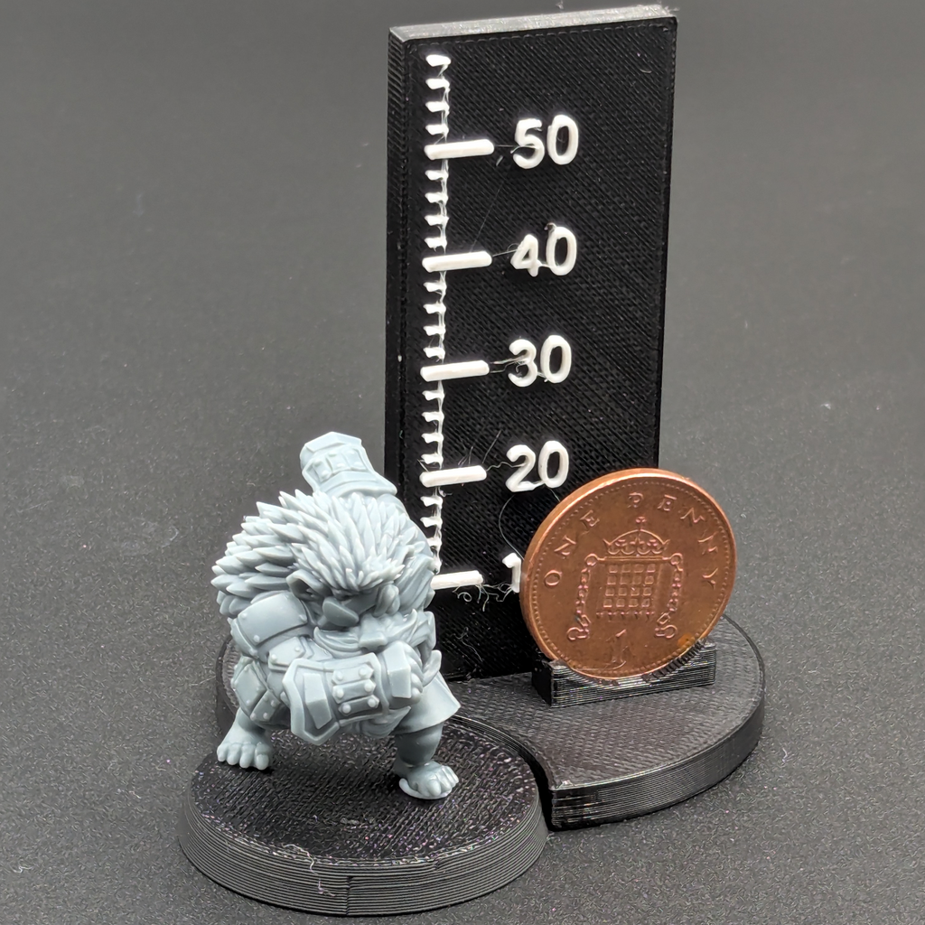 Old Forest Alliance Hedgehog Lineman. Printed in grey resin, next to a scale showing height with a UK penny as a reference.