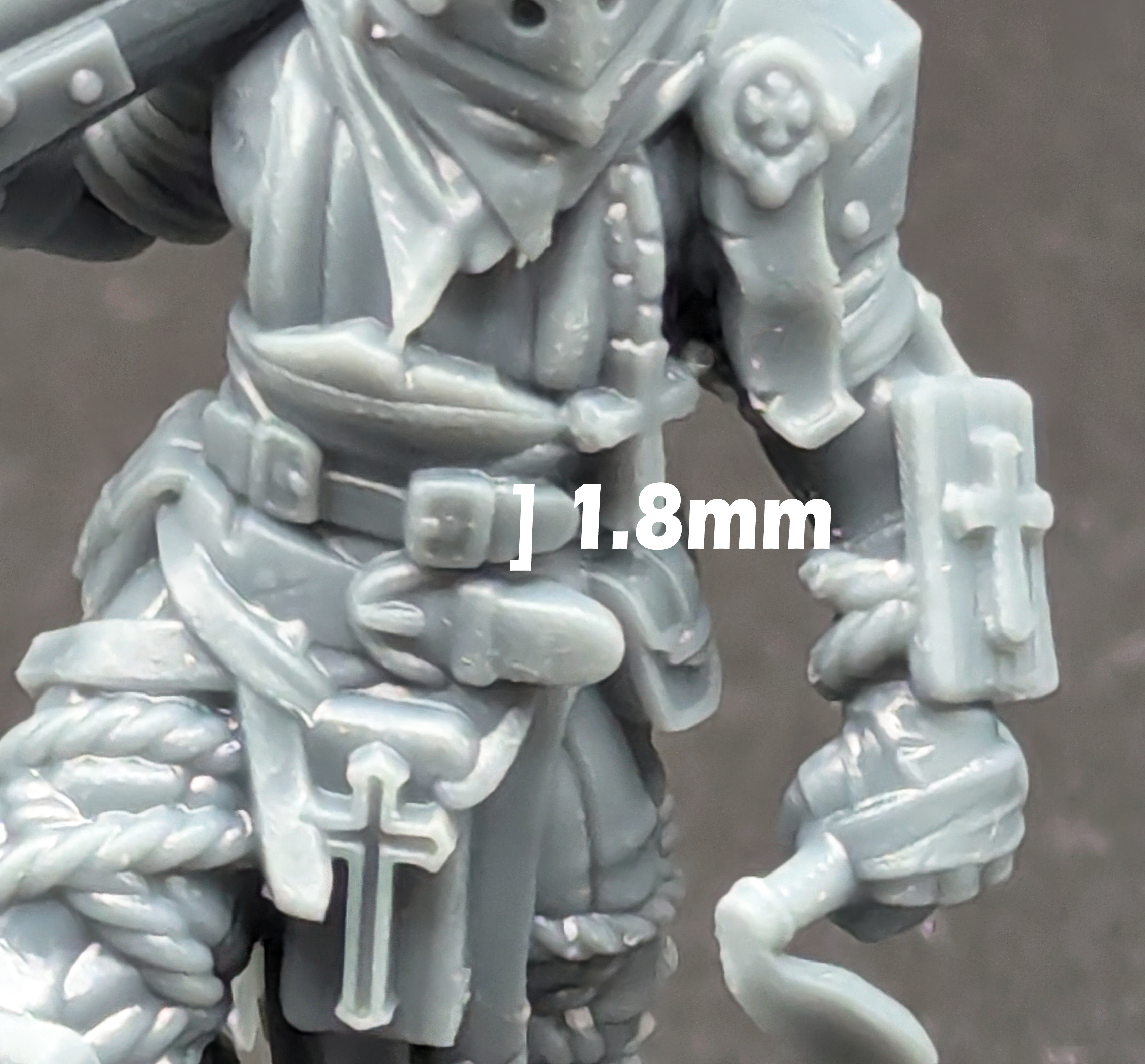An Ashen Armies Puntgun Pilgrim from the Bleeding Procession Warband. Shown in extreme close-up to highlight the detail of the print.