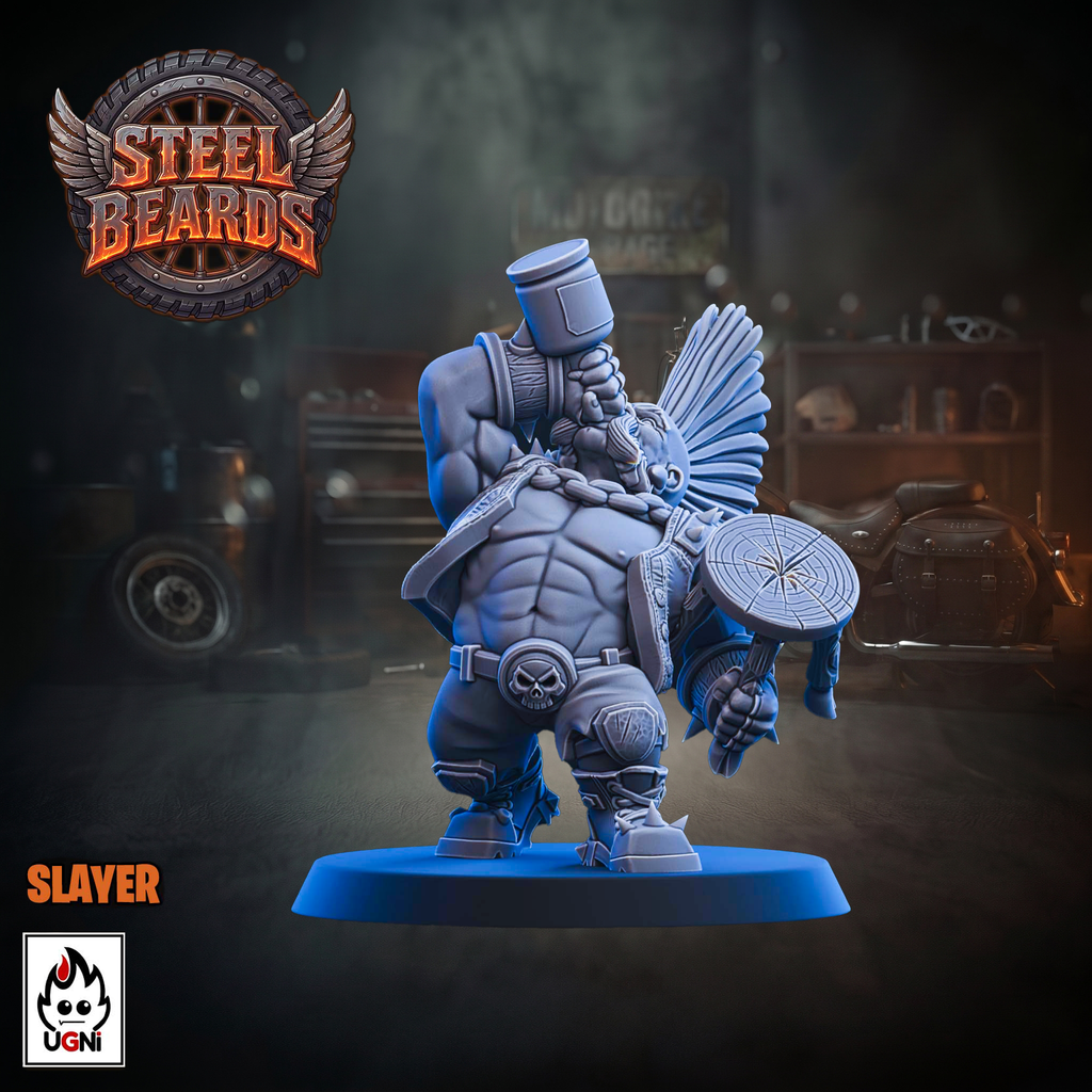 A blue unpainted tabletop miniature figurine of a muscular bearded warrior labeled 'SLAYER' on a round blue base, shown against a dark blurred workshop background with a 'Steel Beards' logo and UGN branding.